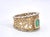 This magnificent wide band ring exemplifies fine Italian Renaissance-inspired craftsmanship, reminiscent of the celebrated...