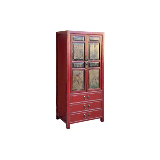 This striking Chinese wedding cabinet is finished in a vibrant, deep cinnabar red lacquer, offering a bold silhouette that...