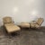 Pair of Woodard outdoor cast metal patio lounge chairs with matching ottomans. The chairs themselves are not marked but...
