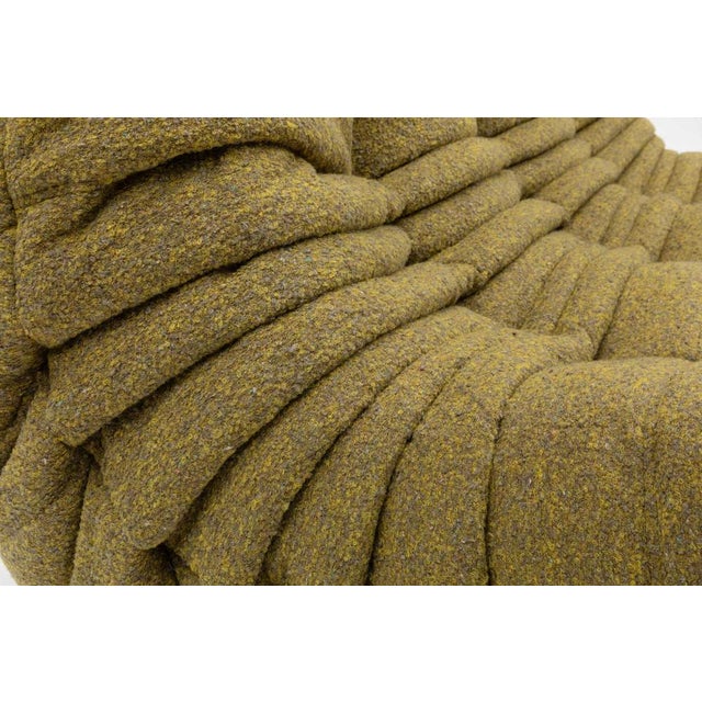 This Togo has been reupholstered with new foam and high-quality new fabric, keeping its inner structure, giving the item...