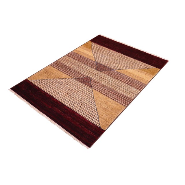 With strict standards of craftsmanship and quality of materials used this modern inspired hand-knotted Gabbeh rug is a...