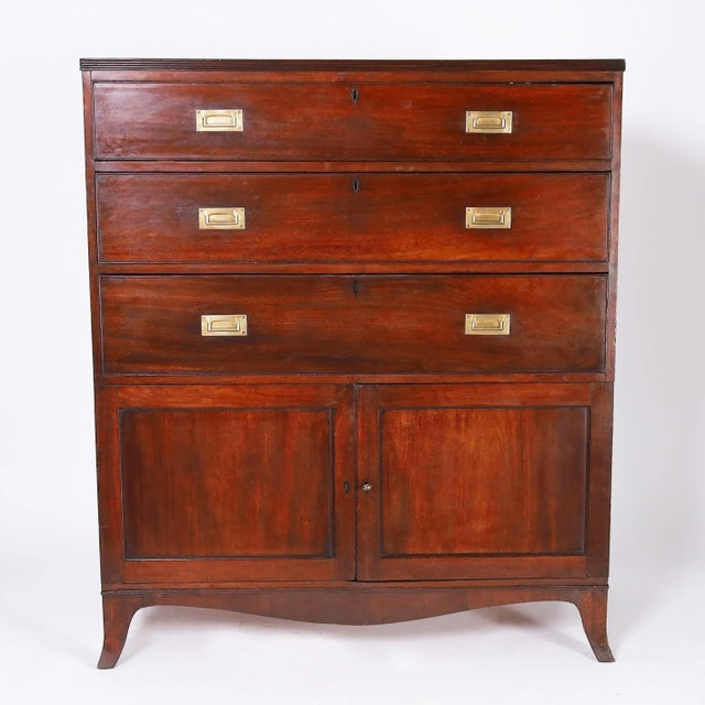 Handsome 18th century British Colonial chest with a beaded cornice over three drawers with campaign hardware in the top of...