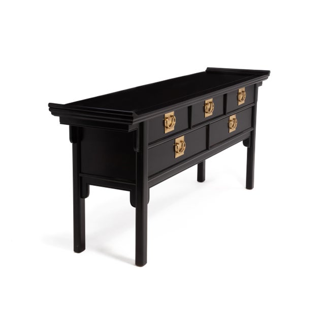 A 1970s Hollywood Regency pagoda style 5-drawer console attributed to the Hua Collection by Century Furniture. The piece...
