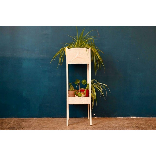 Tall and compact, this antique planter is inspiring and charmingly bohemian. Made entirely of riveted metal, it features...