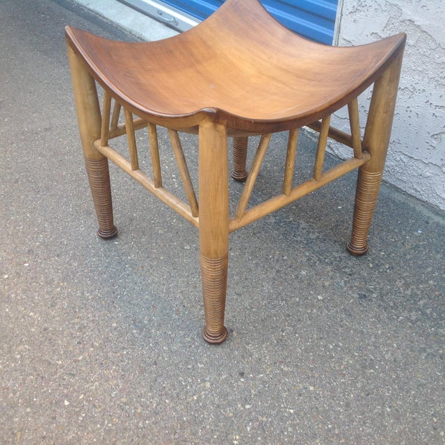 Modern mid-century style ottoman /stool. The modern stool is made os beech and has a washed walnut finish. The stool is in...