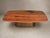 A table with a strong material identity, born from the encounter between the natural expressiveness of walnut and the...