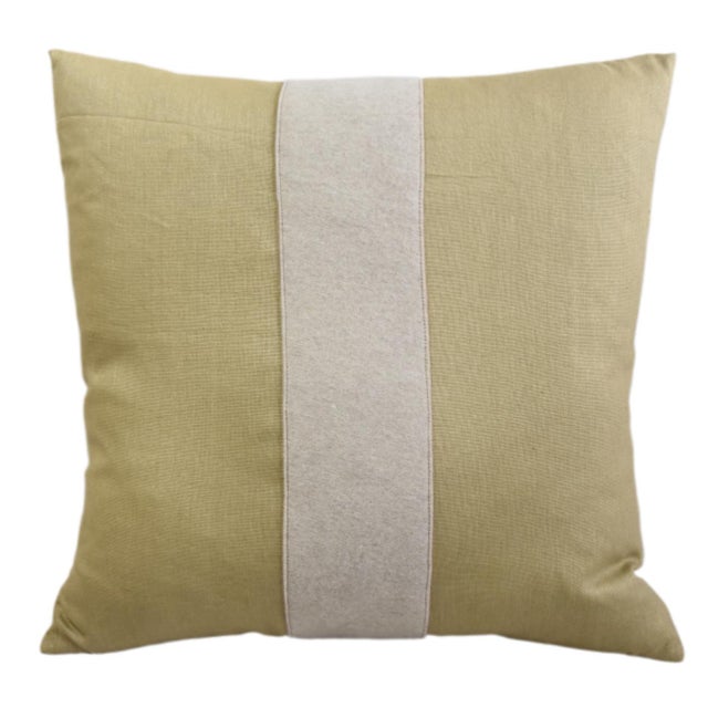 Custom-tailored pillow created from a gold linen textile. Pillow has a cream-colored wool appliqué stripe on the front....