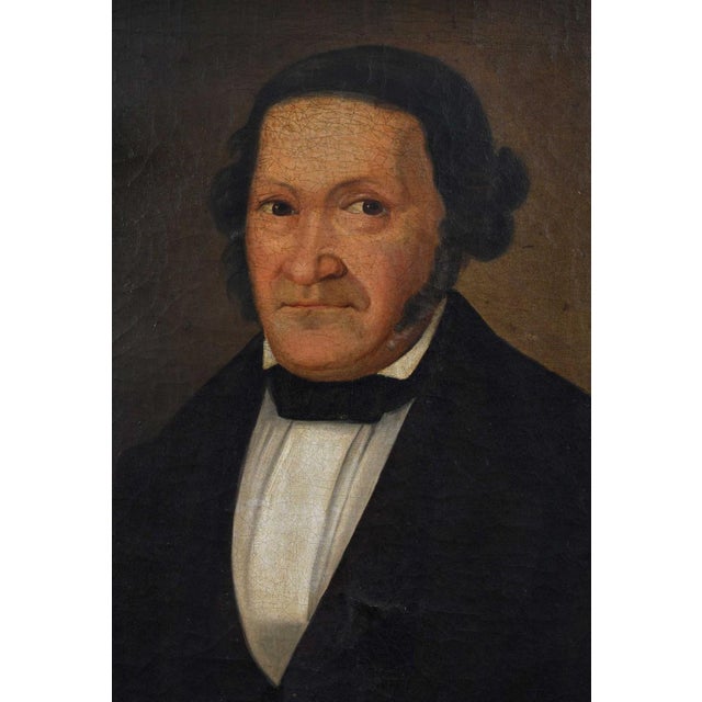 (19th century) Folk Portrait of a Gentleman, unsigned, oil on canvas, 18 x 14-1/2 in.; dark wood frame, 21-1/2 x 18 in.
