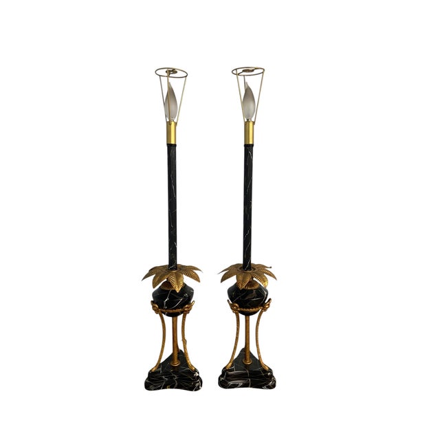 An exceptional, stately pair of Hollywood Regency buffet lamps by the iconic Frederick Cooper. This striking set...