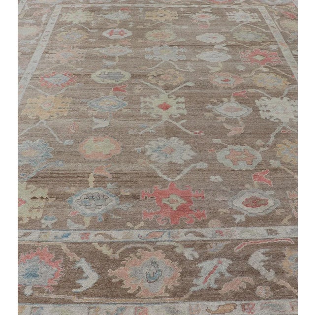 Measures: 12'0 x 15'0 Turkish Oushak Rug with All-Over Floral Design On A Light Brown Field. Keivan Woven Arts / rug...