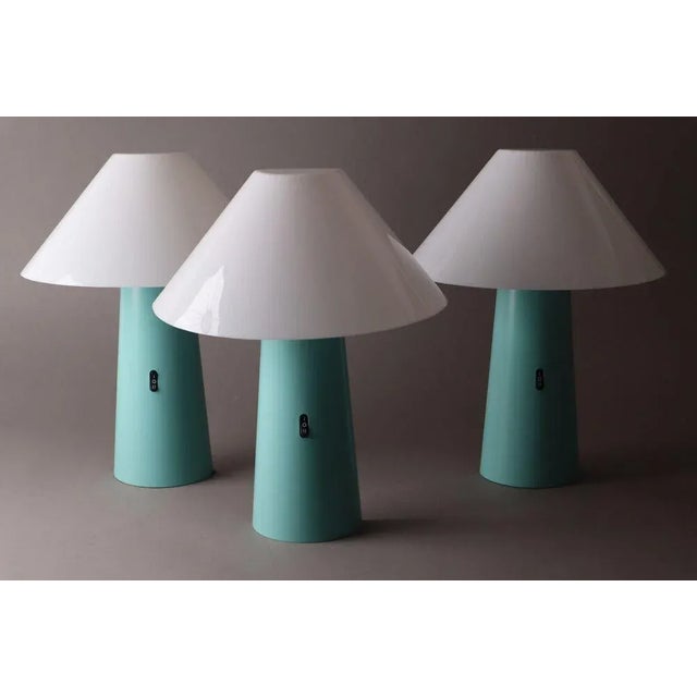 Postmodern Turquoise Wall Lamp from Arlus, 1980s, in Very Good conditions. Designed 1980 to 1989 This piece has an...