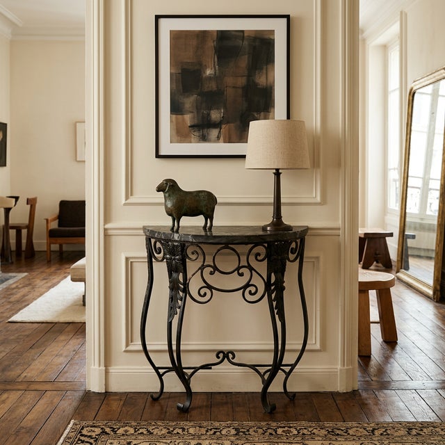 Antique French demilune console table in the Art Deco / Belle Époque style, dating to the late 19th century through the...