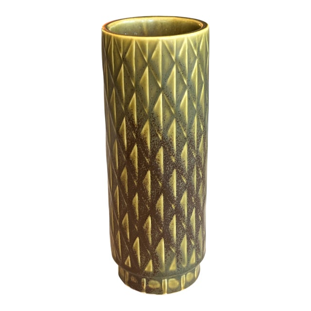 A formidable, olive-green cylinder vase from Gunnar Nylund’s 1967 Eterna series. One of his most well-known designs for...