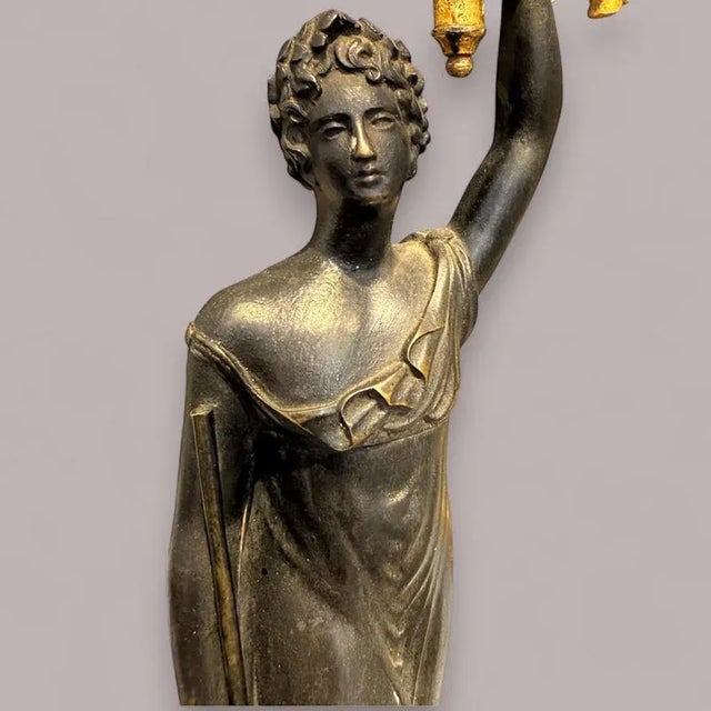 An exceptional pair of Empire period candelabra, dating from the early 19th century, circa 1810. This highly refined pair...