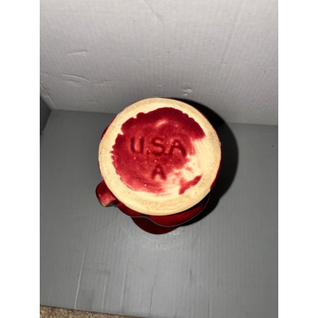 This elegant McCoy Pottery vase features a distinctive flared "petal" or "leaf" design with graceful vertical ribbing and...