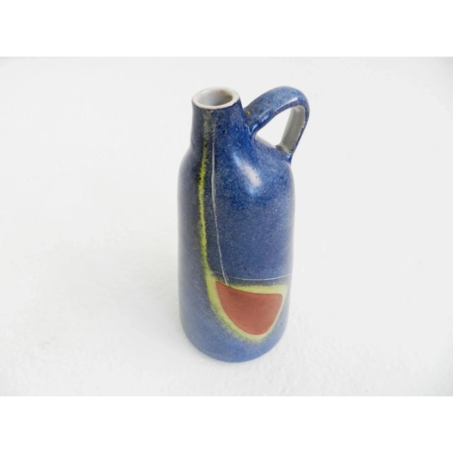 This small vase was made in Germany by Krösselbach, circa 1950. This piece has an attribution mark, I am sure that it is...