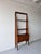 Original condition—appropriate for its age. There is a visible mark on one shelf.