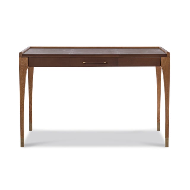 This leather-inset writing desk combines classic craftsmanship with a modern silhouette. The warm oak frame is paired with...