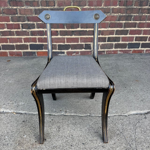 This Regency era chair, believed to be made by John Gee, has a reupholstered seat while the painted wood has been kept in...