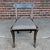 This Regency era chair, believed to be made by John Gee, has a reupholstered seat while the painted wood has been kept in...