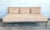 Showcasing crisp geometric lines and an architectural low profile, this late 20th-century modernist sofa features a wide...