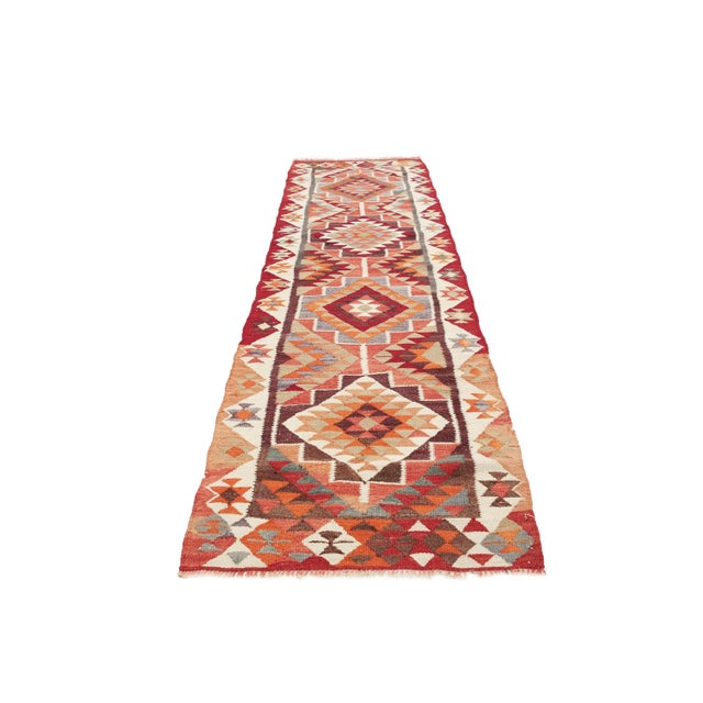 Handwoven vintage decorative kilim runner from Northern Iraq. Approximately 45-55 years old. In very good condition.