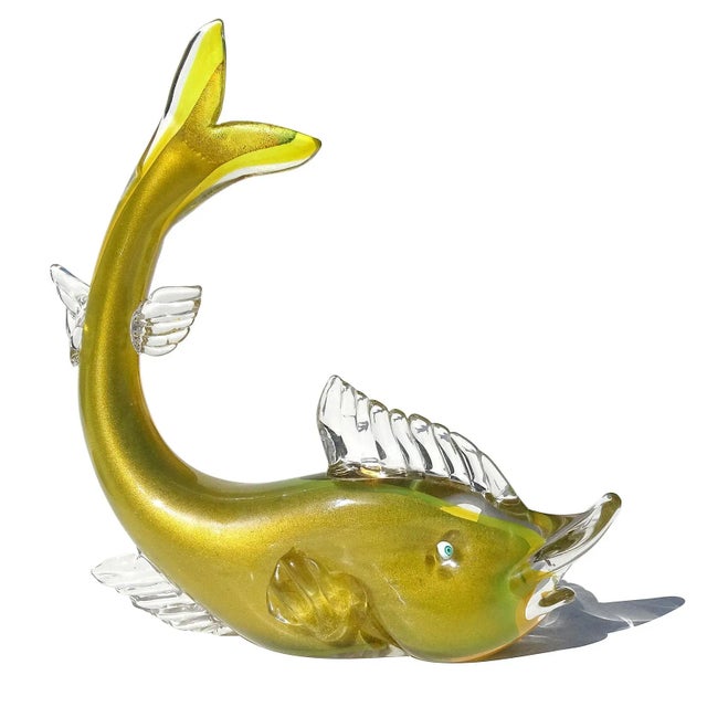 Beautiful and large, vintage Murano hand blown Sommerso yellow with gold aventurine Italian art glass fish sculpture. The...
