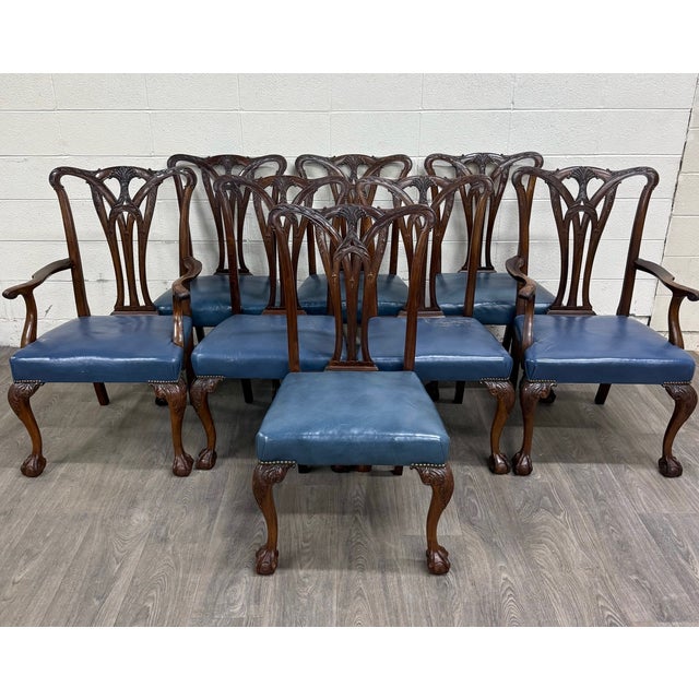 This is a gorgeous set of eight vintage English Chippendale style carved mahogany dining chairs including two armchairs...
