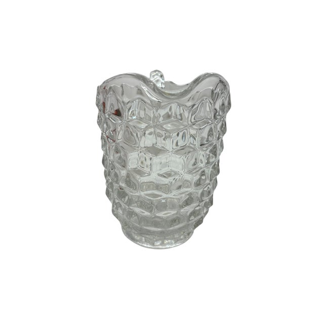 This relish dish, manufactured by Fostoria, is divided into three sections. It features the American pattern, which...
