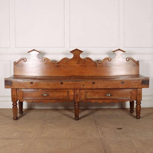 Stunning 19th century French butcher's block featuring a 7" thick worktop and removable back piece. This piece has...