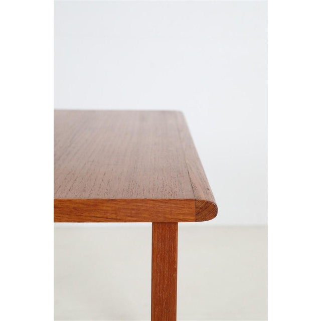 "Capella" side table, design: Illum Wikkelsø, for Niels Eilersen, 1960s, Denmark. Teak (frame: solid, top: veneered)....