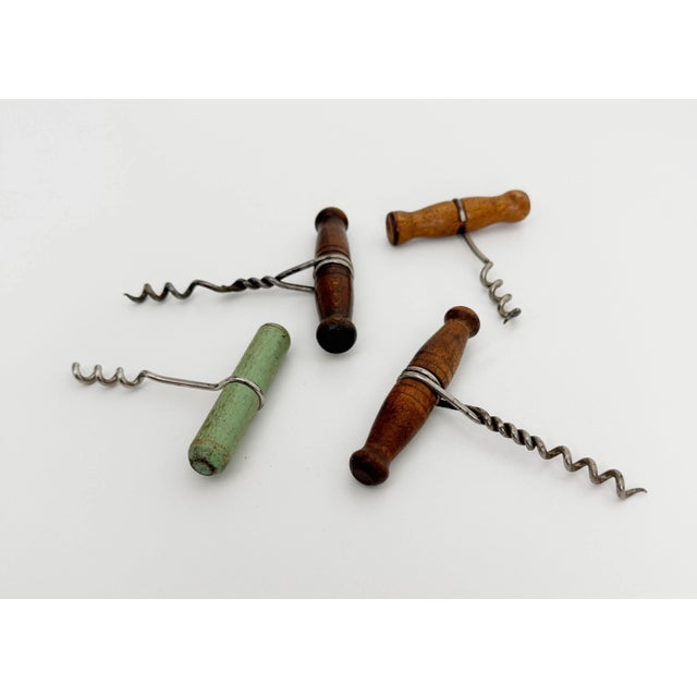 A lovely set of four cork screw bottle openers. In line with styles produced in the early 20th century France. Smaller...