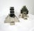 A pair of unique heavy chromed steel industrial vintage automotive jackstands that are used as bookends. Perfect bit of...