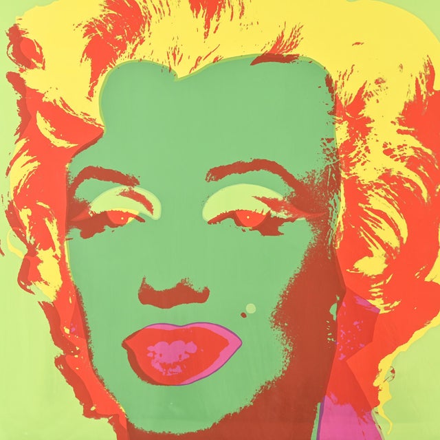 Screenprint depicting the iconic portrait of Marilyn Monroe, based on the work of Andy Warhol and characteristic of his...
