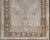 This vintage Turkish Oushak rug (circa mid-20th century) features a unique blend of colors. The multi-layered central...