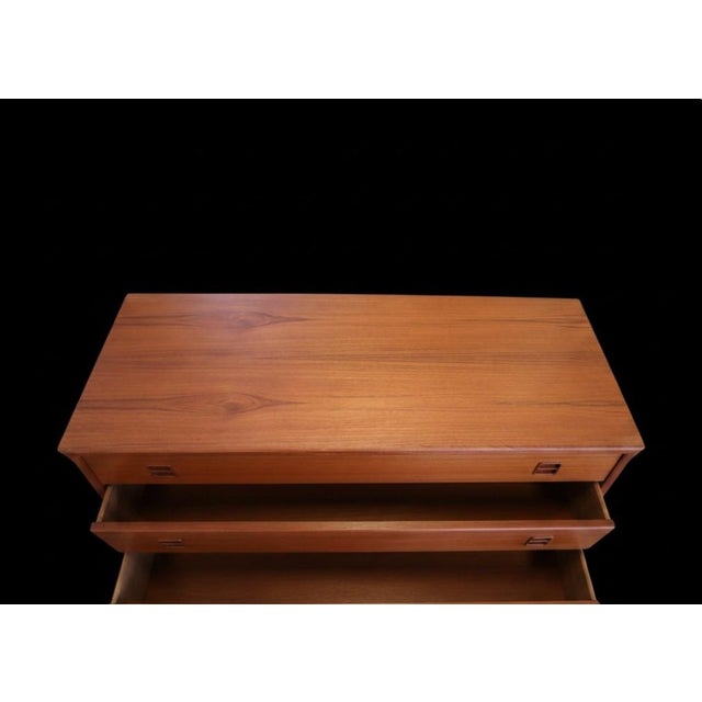 Danish well-built chest of drawers in teak with quality, dimensions and craftsmanship beyond the ordinary. This is an...