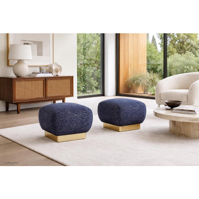 Experience the allure of authentic 1970s American design with this exquisite pair of brass poufs by celebrated designer...