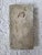 A cast cement decorative door sculpture that has been embellished with gold (likely Rub'n Buff). It measures 7 ¼” x 3 ¾” x...