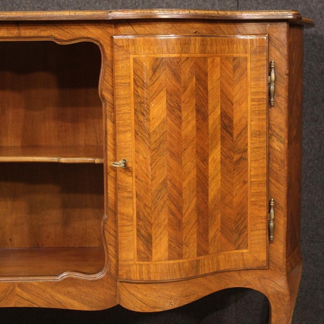 Italian sideboard from the mid-20th century. Beautifully designed piece of furniture, curved on the front and sides,...