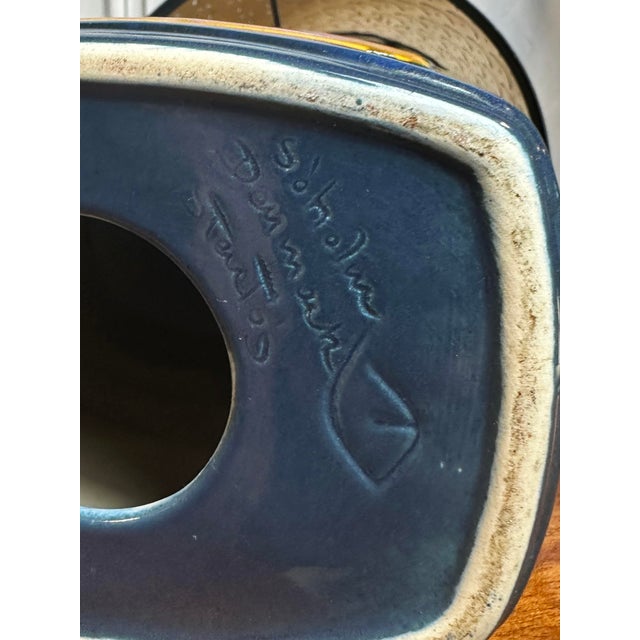 Handcrafted in the mid-20th century, this captivating stoneware table lamp displays the distinctive mark of designer Einar...