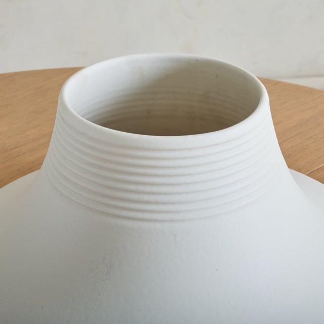 A rare ‘Vesuvio’ vase designed by Angelo Mangiarotti for Gabbianelli in the 1970s. Its modernist, truncated silhouette...