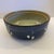 The Skinny A soulful little studio stoneware bowl that feels like twilight at the water’s edge—inky cobalt glaze outside,...