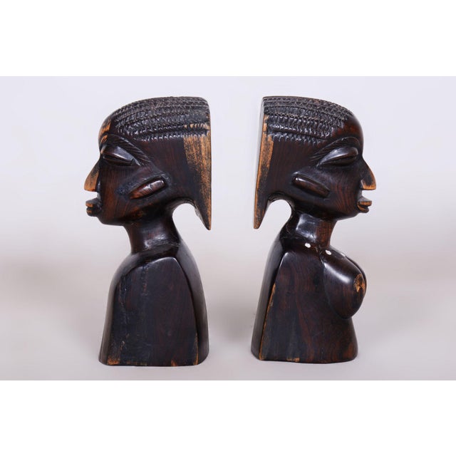This pair of bookends dates back to the beginning of the 20th century and is a fascinating testament to African...