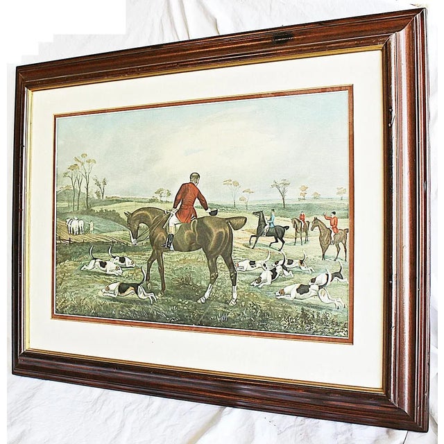 A classical English hunt scene, framed in dark wood, slight frame marks, very clean print and matting.