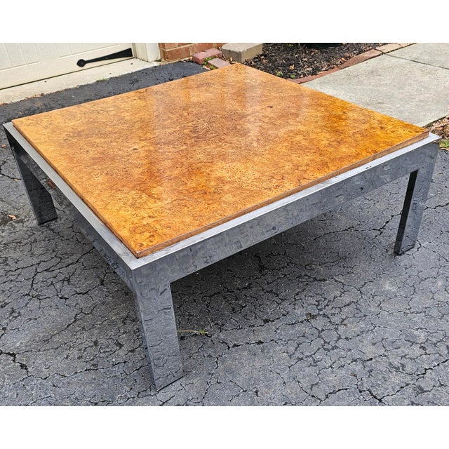 This Vintage Milo Baughman for Thayer Coggin Style Burl and Chrome Cocktail Table brilliantly combines mid-century modern...