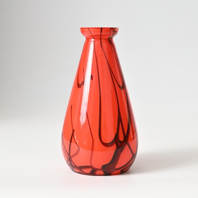 Red and black spatter glass vase from Franz Tomschick. Made in 1920s in former Czechoslovakia. This type of glass is often...