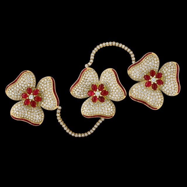 Introducing the exquisite Natural 12 Ct Burma Ruby & 30 Ct Diamond Trio Pin, a truly unique piece crafted from 18 Karat...