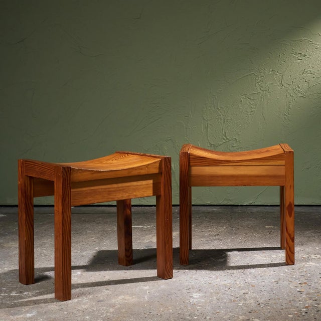 This set of stools was produced in the 1960s and is made from solid Oregon pine. Each stool features a single curved seat...