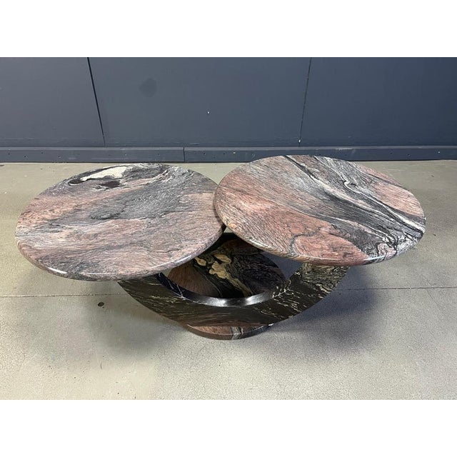 Timeless marble coffee tables with two round tops. Beautiful arched base and attractive natural vains in the stone. Good...