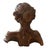 A hand carved portrait bust of a woman from 17th century Europe, made from wood, probably lime wood, and finished in...